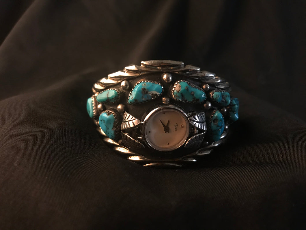 Wide silver-color Navajo watch bracelet initialed by artist