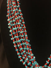 Load image into Gallery viewer, 7 strand necklace of small red glass beads with chips of coral
