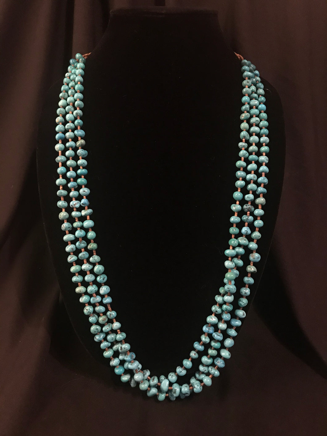 3 strand necklace of olive heishi beads with tumbled treated turquoise nuggets,