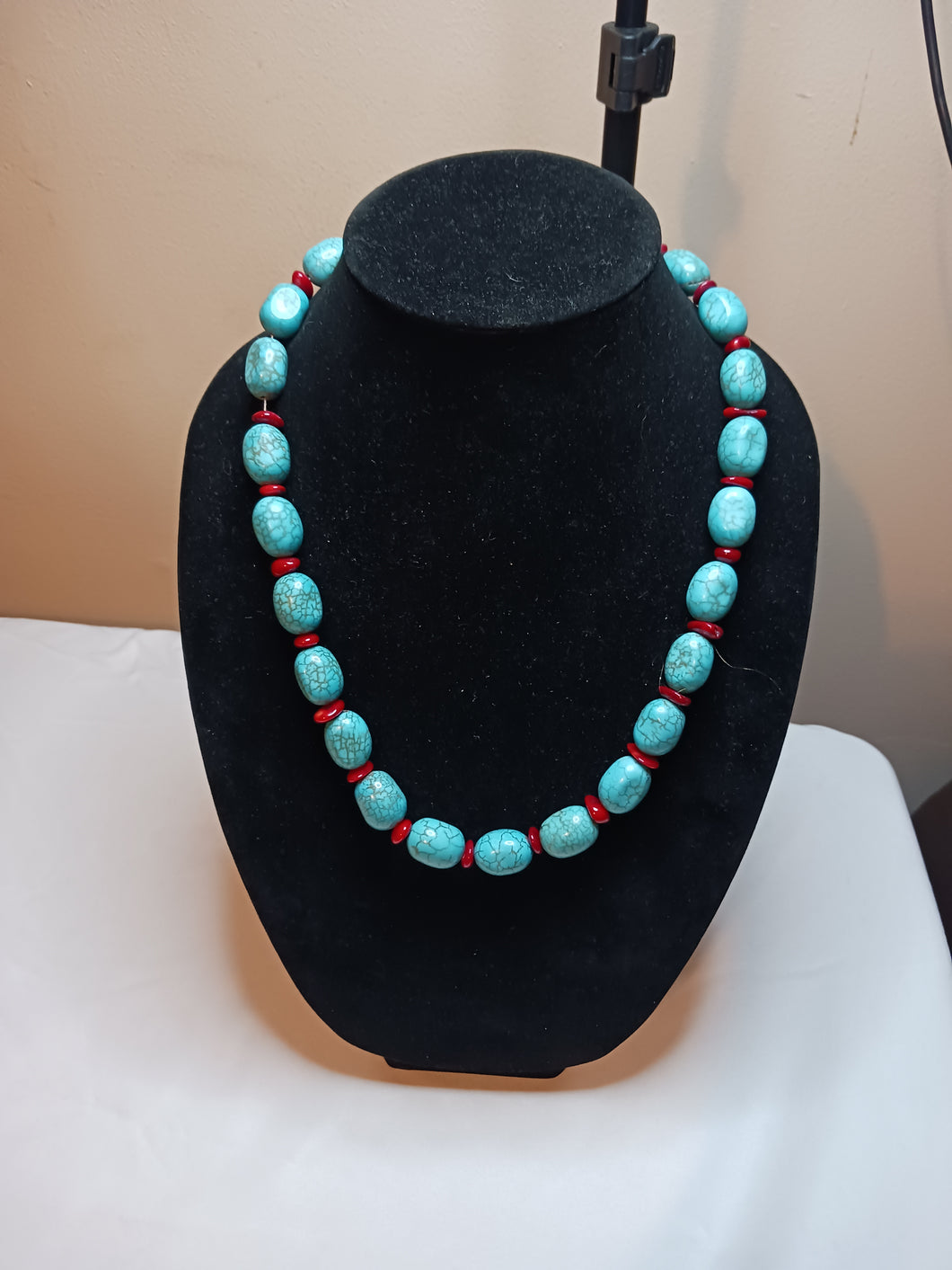 Turquoise block beads interspersed with coral dyed beads