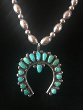 Load image into Gallery viewer, Single strand necklace of commercial silver beads with turquoise naja
