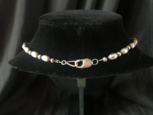 Load image into Gallery viewer, Single strand necklace of commercial silver beads with turquoise naja
