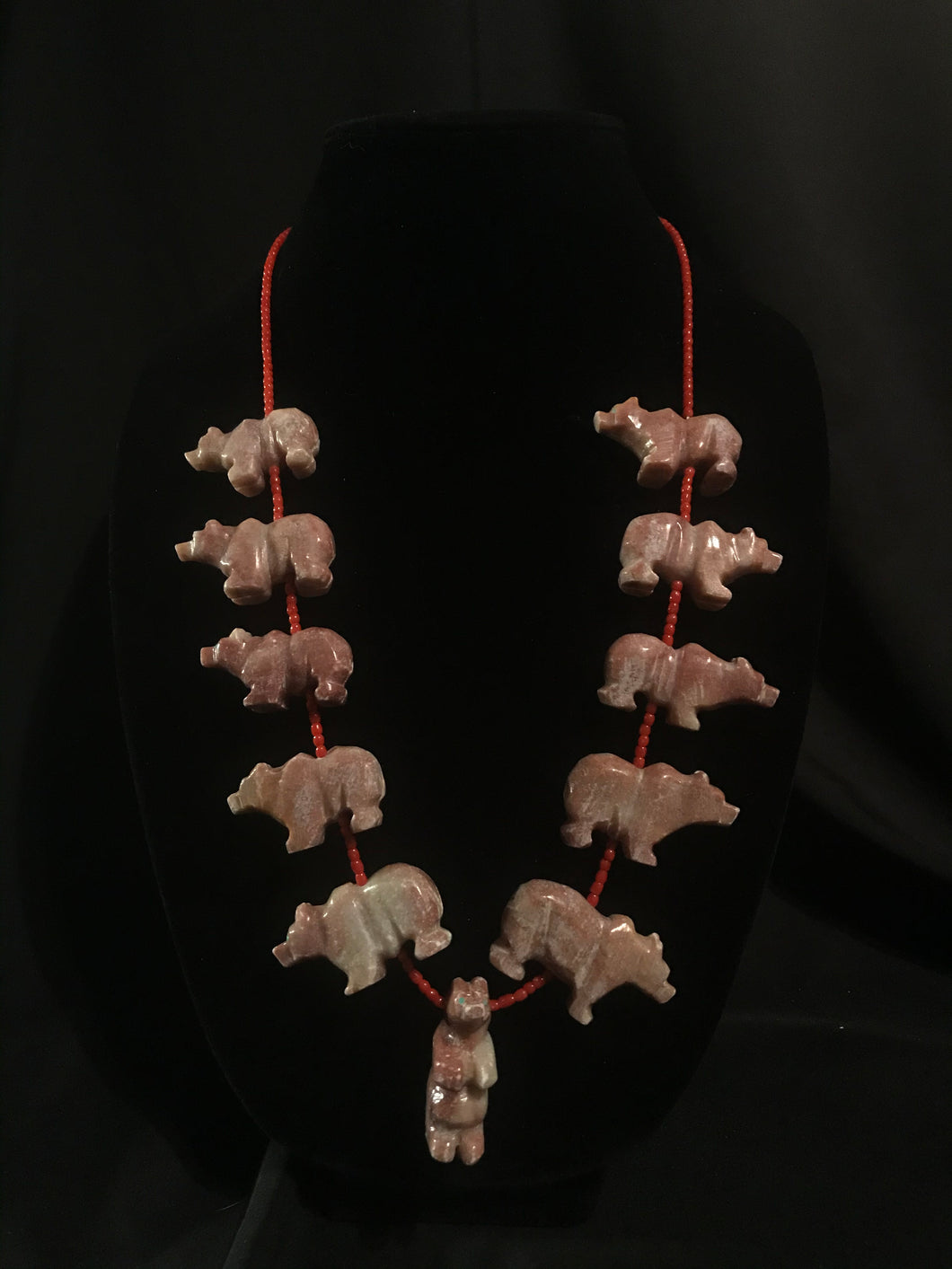 Navajo single strand necklace with coral beads and pink alabaster or pink agate bears.
