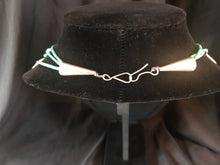 Load image into Gallery viewer, Zuni 3 strand rolled turquoise bead necklace with carved fetishes.
