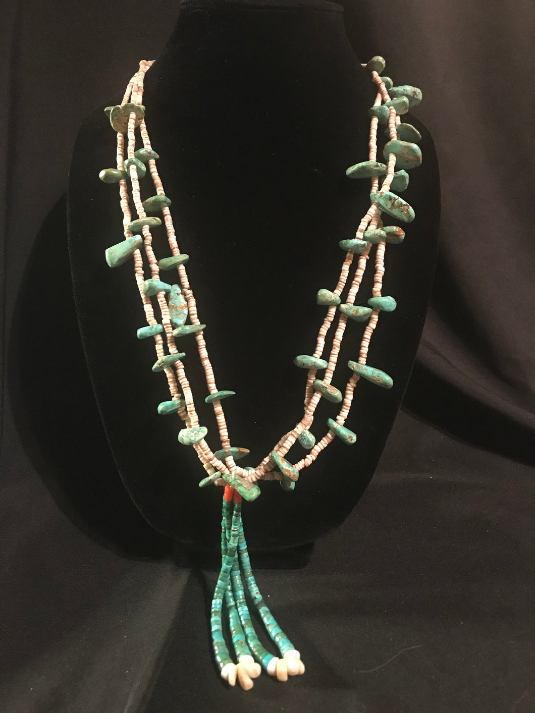 Santo Domingo 3 strand olive heishi necklace with varied shape turquoise tabs.