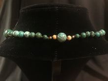 Load image into Gallery viewer, Single strand necklace of barrel shaped beads turquoise in color
