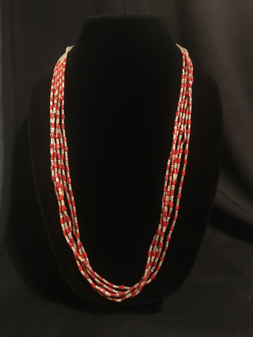 Five strands of olive shell heshe; Santa Domingo pueblo