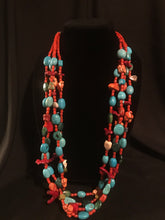 Load image into Gallery viewer, Four strands red glass spun beads with other materials interspersed
