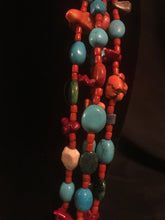Load image into Gallery viewer, Four strands red glass spun beads with other materials interspersed

