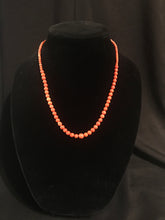 Load image into Gallery viewer, Single strand of graduated round coral beads with matching earrings
