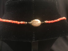 Load image into Gallery viewer, Single strand of graduated round coral beads with matching earrings
