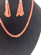 Load image into Gallery viewer, Single strand of graduated round coral beads with matching earrings
