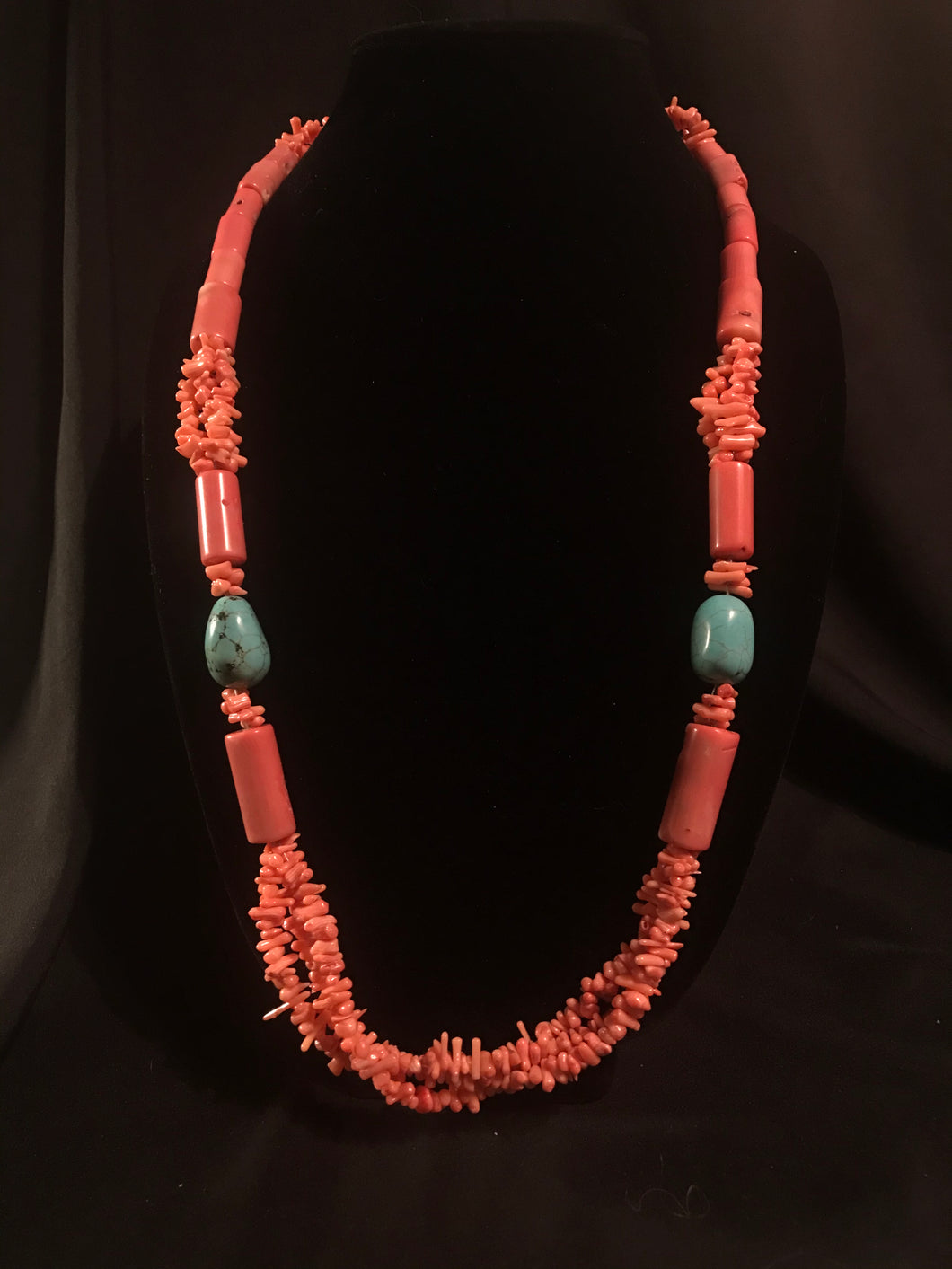 Single strand necklace of large dyed Asian coral cylinder beads