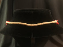 Load image into Gallery viewer, Four strand necklace of olive heishi beads interspersed with dyed red coral tube beads.
