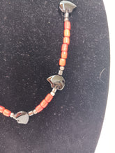 Load image into Gallery viewer, Necklace of red spun glass with carved black bears
