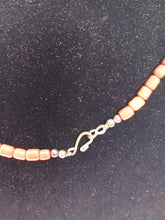 Load image into Gallery viewer, Necklace of red spun glass with carved black bears
