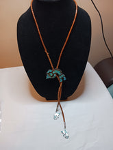 Load image into Gallery viewer, Zuni rainbow man bolo with turquoise inlay
