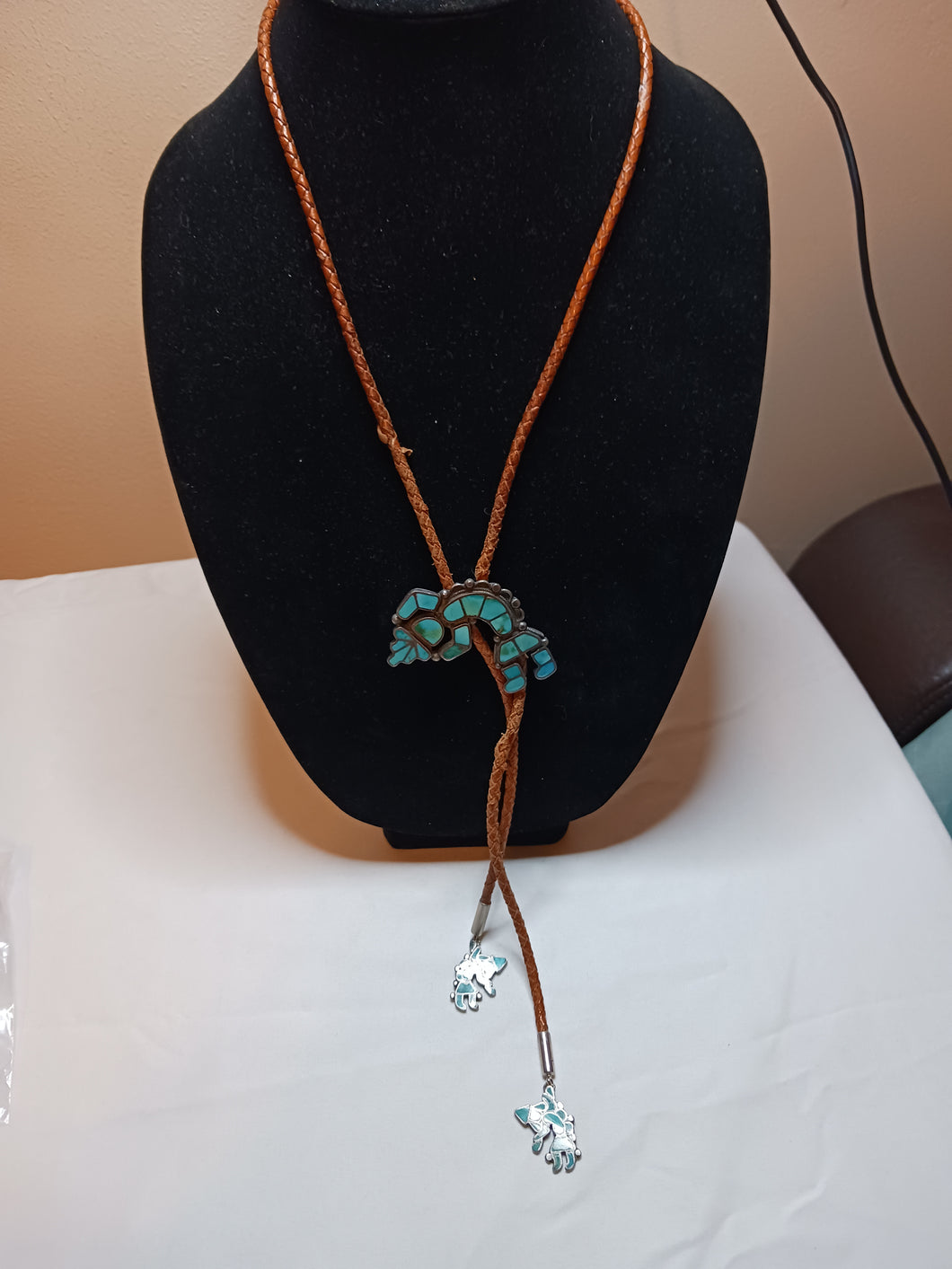 Zuni rainbow man bolo with turquoise inlay