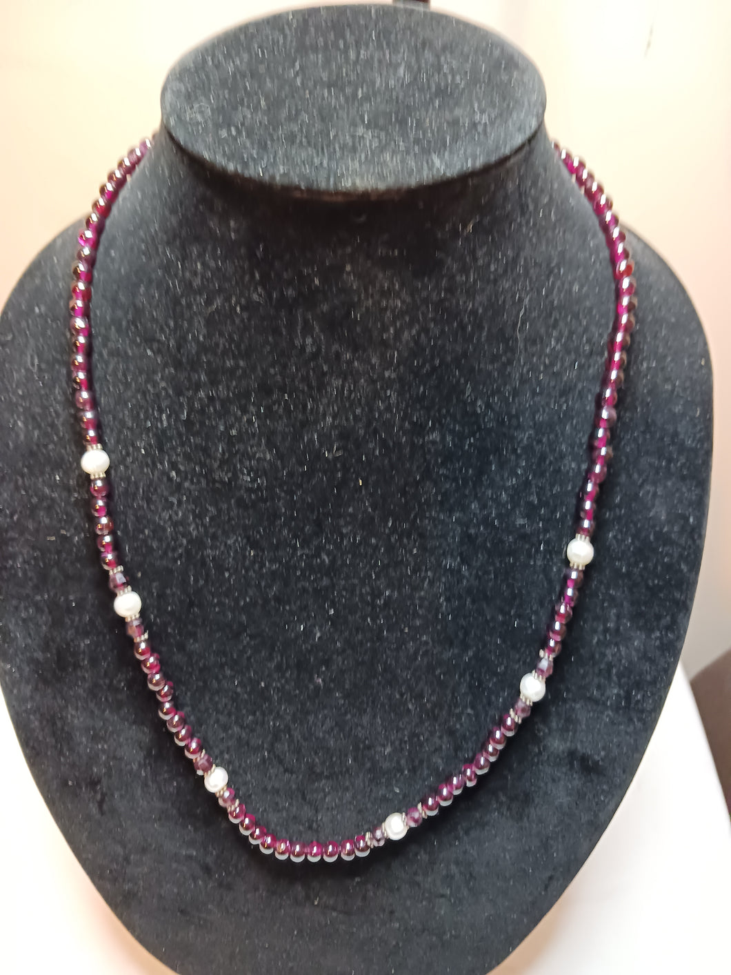 Garnet bead necklace interspersed with pearl-like beads