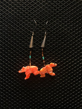 Load image into Gallery viewer, Silver colored hook earrings with coral colored bear fetish from spiny oyster.
