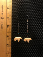 Load image into Gallery viewer, Silver colored hook earrings with dark beads and white bear fetish. Approximately 2.5” dangle.

