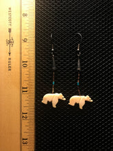 Load image into Gallery viewer, Silver colored hook earrings with dark beads and white bear fetish. Approximately 2.5” dangle.
