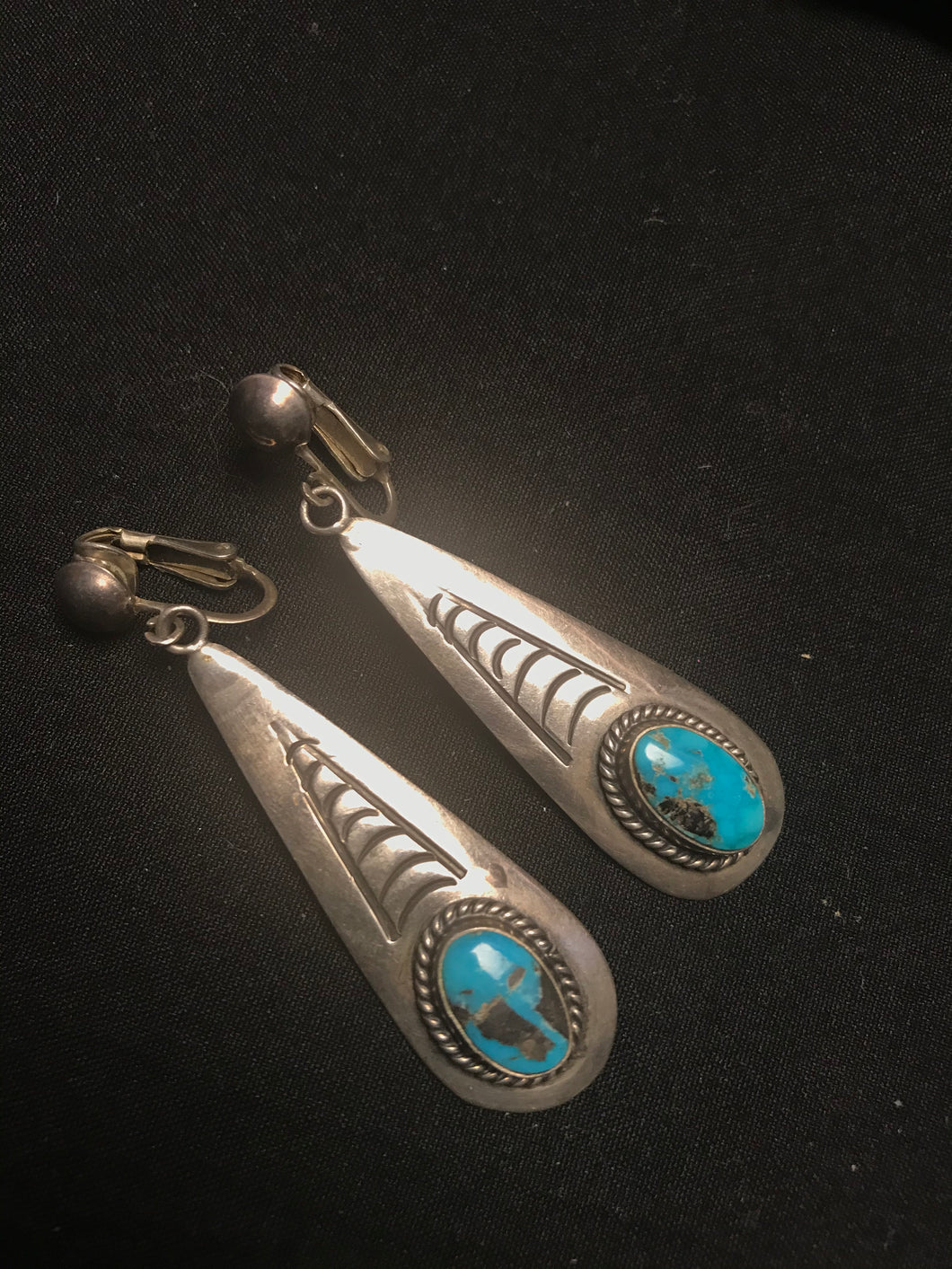 Clip on tear drop earrings.