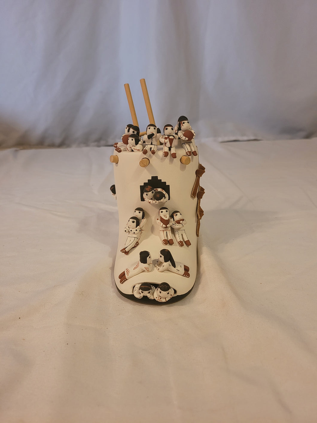 Cochiti Pueblo Moccasin Story Teller by with 17 children by Mary Evangeline(Vangie) Suina. 1959